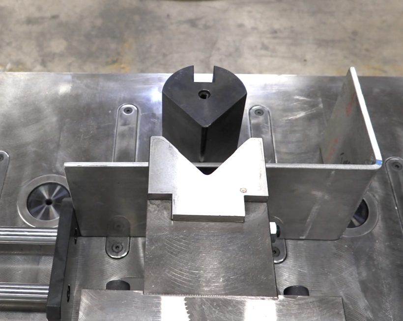 Sunrise HBM horizontal bender with one side of a channel formed around the fixed punch