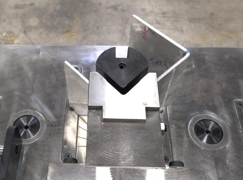 Final bend closing a U-channel around the fixed punch on a Sunrise HBM horizontal bending machine
